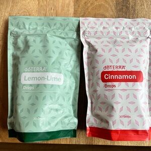 doTERRA Lemon-Lime and Cinnamon Drops in Green and Red Packaging duo